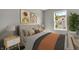 Cozy bedroom with upholstered bed frame and neutral decor at 4652 Kimmeridge Ln, Indianapolis, IN 46254