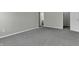 Spacious bedroom with gray carpet and access to bathroom at 4652 Kimmeridge Ln, Indianapolis, IN 46254