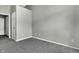 Bright bedroom featuring grey walls and carpet at 4652 Kimmeridge Ln, Indianapolis, IN 46254