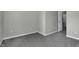 Spacious bedroom with neutral walls and grey carpeting at 4652 Kimmeridge Ln, Indianapolis, IN 46254