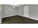 Bright dining room with dark laminate floors and recessed lighting at 4652 Kimmeridge Ln, Indianapolis, IN 46254
