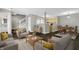 Inviting living room boasts an open floor plan with staircase and access to a full kitchen at 4652 Kimmeridge Ln, Indianapolis, IN 46254