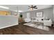 Spacious living room with dark hardwood floors and modern decor at 4652 Kimmeridge Ln, Indianapolis, IN 46254