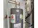 Utility room with water heater and HVAC system at 4652 Kimmeridge Ln, Indianapolis, IN 46254