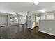 Open living area with kitchen, living room, and access to patio at 4652 Kimmeridge Ln, Indianapolis, IN 46254