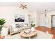 Bright living room with hardwood floors and neutral decor at 4842 Ashbrook Dr, Noblesville, IN 46062