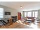 Living room with fireplace and large windows at 502 W 38Th St, Indianapolis, IN 46208