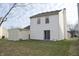 Back of house with sliding glass door and storage shed at 504 Grand Woods Dr, Indianapolis, IN 46224