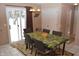 Dining area with table and chairs near sliding door at 504 Grand Woods Dr, Indianapolis, IN 46224
