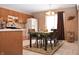 Kitchen with oak cabinets and dining area at 504 Grand Woods Dr, Indianapolis, IN 46224
