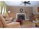 Cozy living room with fireplace and ample seating at 504 Grand Woods Dr, Indianapolis, IN 46224