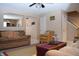 Spacious living room with multiple seating areas at 504 Grand Woods Dr, Indianapolis, IN 46224