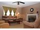 Living room featuring a fireplace and comfy seating at 504 Grand Woods Dr, Indianapolis, IN 46224