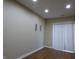 Dining area with hardwood floors and sliding door access at 513 N Park Ave, Indianapolis, IN 46202