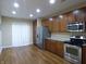 Eat-in kitchen with stainless steel appliances and wood cabinets at 513 N Park Ave, Indianapolis, IN 46202