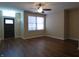 Living room with hardwood floors and a ceiling fan at 513 N Park Ave, Indianapolis, IN 46202