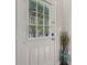 Inviting entryway with a white front door featuring glass panels and stylish decor at 6595 Reserve Dr, Indianapolis, IN 46220