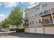 Three-story townhomes with garages and balconies at 6595 Reserve Dr, Indianapolis, IN 46220