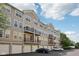 Three-story townhomes with garages and balcony at 6595 Reserve Dr, Indianapolis, IN 46220