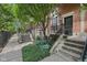 Charming brick townhomes with landscaped front entrances and black iron railings add to this inviting exterior at 6595 Reserve Dr, Indianapolis, IN 46220