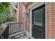 Inviting brick exterior showcases a charming front door with glass panel and a 'Welcome' sign to greet guests at 6595 Reserve Dr, Indianapolis, IN 46220