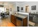 Stylish kitchen with granite countertops, stainless steel appliances, and open layout to dining area at 6595 Reserve Dr, Indianapolis, IN 46220