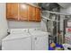 Laundry room with washer, dryer and utility sink at 6595 Reserve Dr, Indianapolis, IN 46220