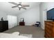 Spacious bedroom with vaulted ceiling, ample natural light, and neutral walls at 6595 Reserve Dr, Indianapolis, IN 46220