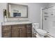 Updated bathroom with granite vanity and walk-in shower at 7 Watson Dr, Trafalgar, IN 46181