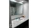 Bathroom with a vanity and mosaic-tiled mirror at 81 Middleton Rd, Franklin, IN 46131
