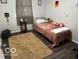 Cozy bedroom with a twin-sized bed and neutral decor at 81 Middleton Rd, Franklin, IN 46131