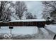Brick ranch house with snowy front yard at 81 Middleton Rd, Franklin, IN 46131
