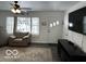 Living Room with large TV and comfy armchair at 81 Middleton Rd, Franklin, IN 46131