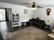 Spacious living room featuring a comfy sectional sofa and large area rug at 81 Middleton Rd, Franklin, IN 46131
