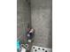 Clean shower with gray tile and a tiered caddy at 81 Middleton Rd, Franklin, IN 46131