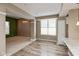 Dining area with hardwood floors and view into kitchen at 8640 Lantern Farms Dr, Fishers, IN 46038