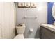 Bathroom with shower, toilet and a white vanity at 9114 Rymark Dr, Indianapolis, IN 46250