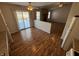 Open concept dining area with laminate wood floors and a view of the living room at 9120 Jene Ct, Indianapolis, IN 46234