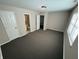 Main bedroom with carpet, neutral walls, and ensuite bath access at 9120 Jene Ct, Indianapolis, IN 46234
