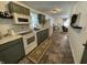 Modern kitchen with white appliances and green cabinets at 92 Morgan St, Mooresville, IN 46158