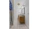 Double vanity bathroom with granite countertops and tiled floors at 10 Sycamore Ct, Brownsburg, IN 46112