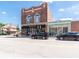 A brick building with retail space, featuring a boutique shop and other businesses at 1060 Stringtown Pike, Cicero, IN 46034