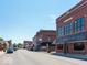 Street view of brick buildings, showcasing various businesses in a town at 1060 Stringtown Pike, Cicero, IN 46034