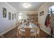 Formal dining room with wood table, chairs, and hardwood floors at 10963 Field Crescent Cir, Noblesville, IN 46060