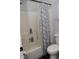 Clean bathroom with a shower/tub combo and toilet at 12306 Split Granite Dr, Fishers, IN 46037