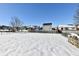 Spacious backyard with snow covered ground and a privacy fence at 126 Hilltop Farms Blvd, New Whiteland, IN 46184