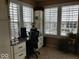 Home office with desk, window, and plants at 13952 Avalon Blvd, Fishers, IN 46037