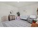 Bedroom featuring crib, dresser, and neutral decor at 15360 Fenchurch Dr, Westfield, IN 46074