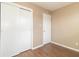 Bright bedroom with double door closet and wood flooring at 1704 Nelson Ave, Indianapolis, IN 46203