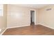 Bedroom with wire shelving and wood flooring at 1704 Nelson Ave, Indianapolis, IN 46203